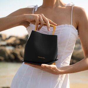 Verano hill Vienna black leather gold asymmetrical geometric crossbody mini bag